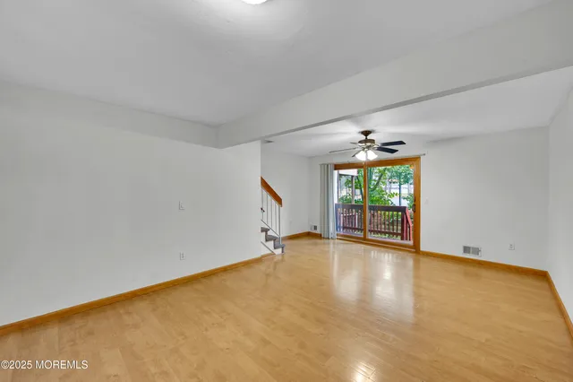 a refrigerator freezer sitting inside of a kitchen