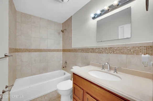 a view of a balcony with wooden floor