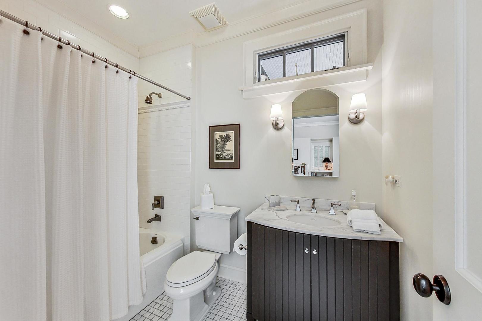3510 Spring Road Oak Brook, IL 60523 - Photo 20 of 31 a bathroom with a sink a toilet and a mirror