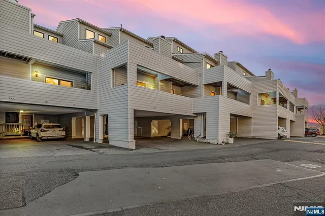 a view of a building with a street