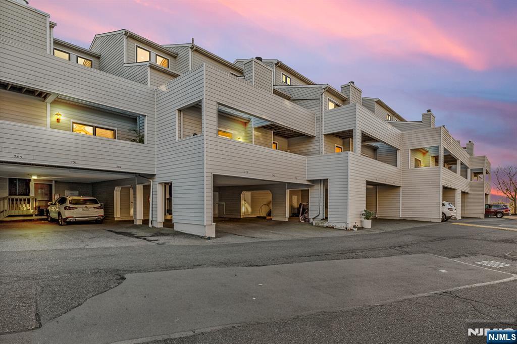 a view of a building with a street
