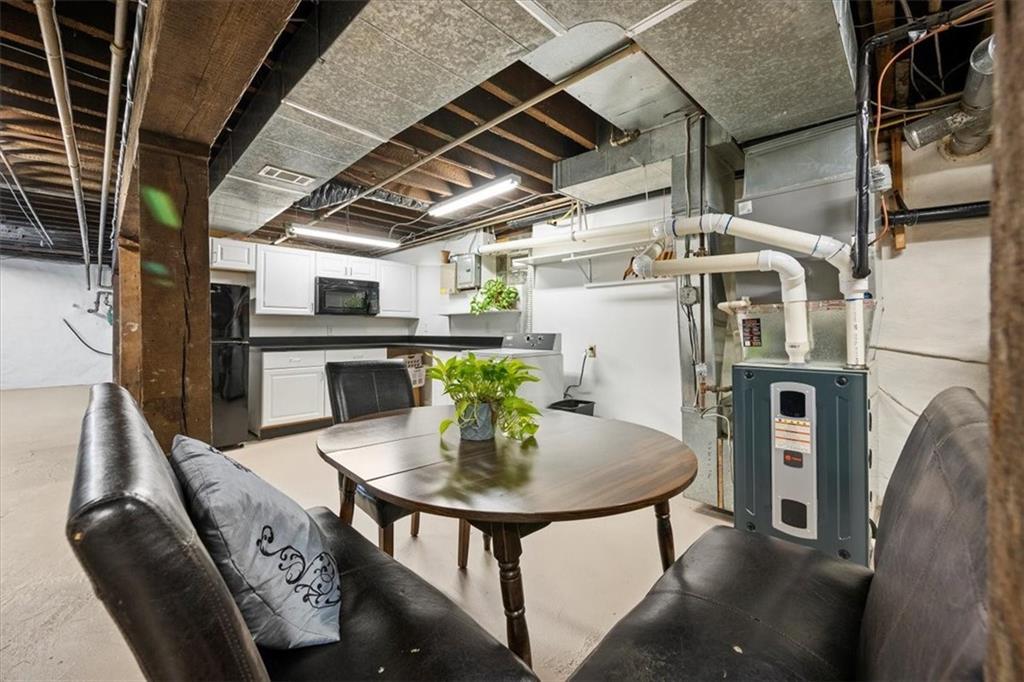 4731 Butler Street Pittsburgh, PA 15201 - Photo 21 of 50 a view of a kitchen with furniture and a kitchen view