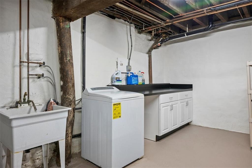 4731 Butler Street Pittsburgh, PA 15201 - Photo 23 of 50 a utility room with dryer and washer