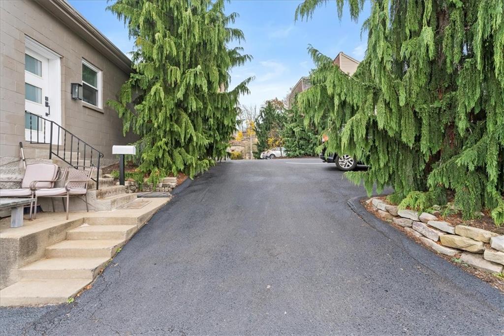 4731 Butler Street Pittsburgh, PA 15201 - Photo 48 of 50 a view of a patio with table and chairs and potted plants