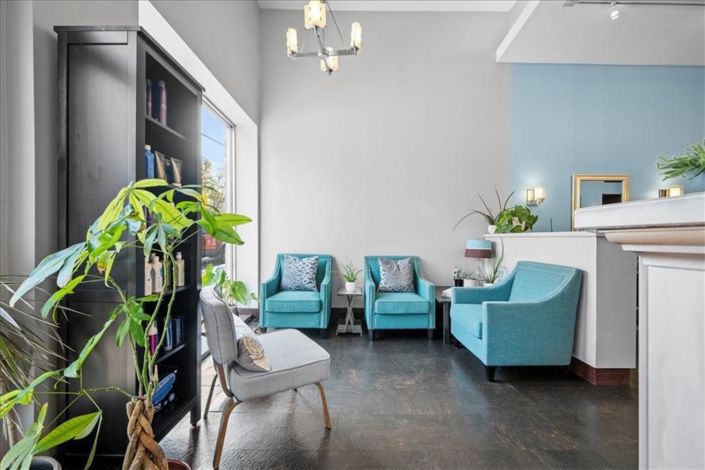 4731 Butler Street Pittsburgh, PA 15201 - Photo 5 of 50 a living room with furniture and a potted plant