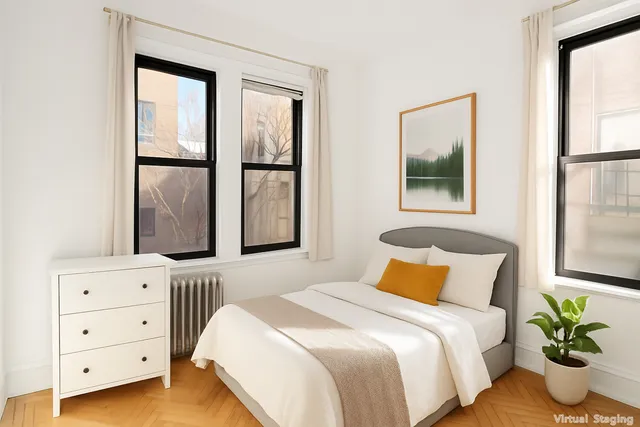 a kitchen with a cabinets and white appliances