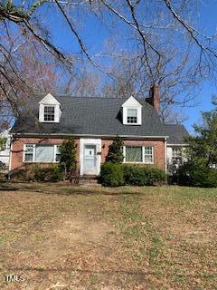 333 Leasburg Road Roxboro, NC 27573 - Photo 1 of 12 a front view of a house with a yard