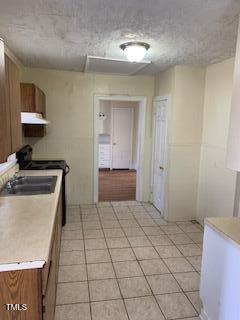 333 Leasburg Road Roxboro, NC 27573 - Photo 4 of 12 a room with a washing machine and a sink