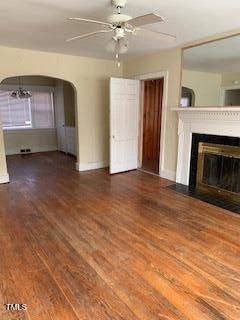 333 Leasburg Road Roxboro, NC 27573 - Photo 5 of 12 a view of an empty room with a fireplace and a window