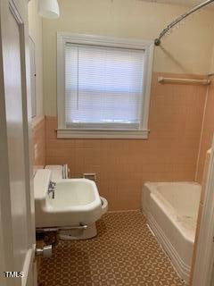 333 Leasburg Road Roxboro, NC 27573 - Photo 7 of 12 a bathroom with a sink toilet and shower
