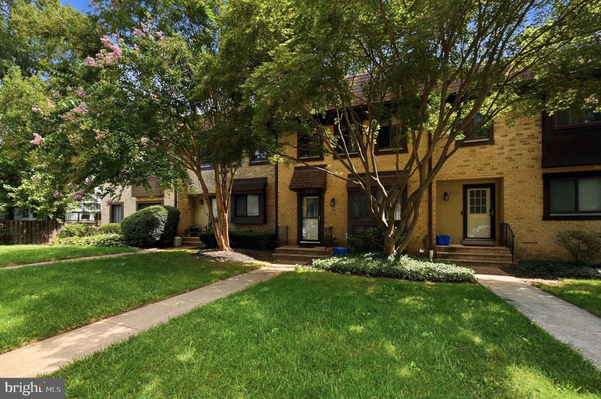 2908 Jermantown Road, Unit 24 Oakton, VA 22124 - Photo 71 of 74 Charming townhomes with lush greenery.