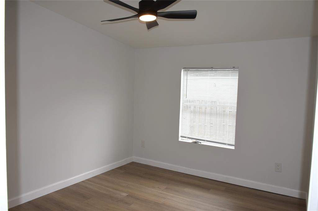 22971 Tradewind Road Boca Raton, FL 33428 - Photo 13 of 13 an empty room with a window