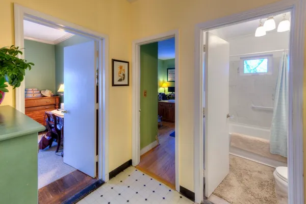 a bed room with a bed and a window