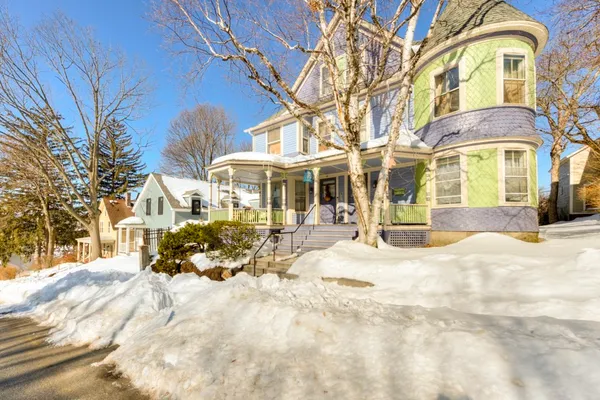 a view of a building with a street