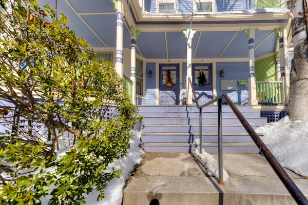 a view of a house with a porch