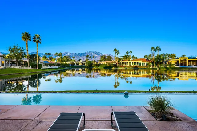 a room with a table and chairs