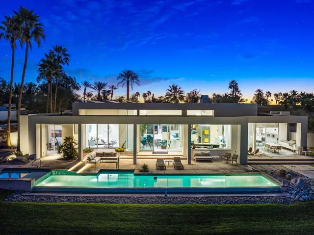 a view of balcony with furniture and city view