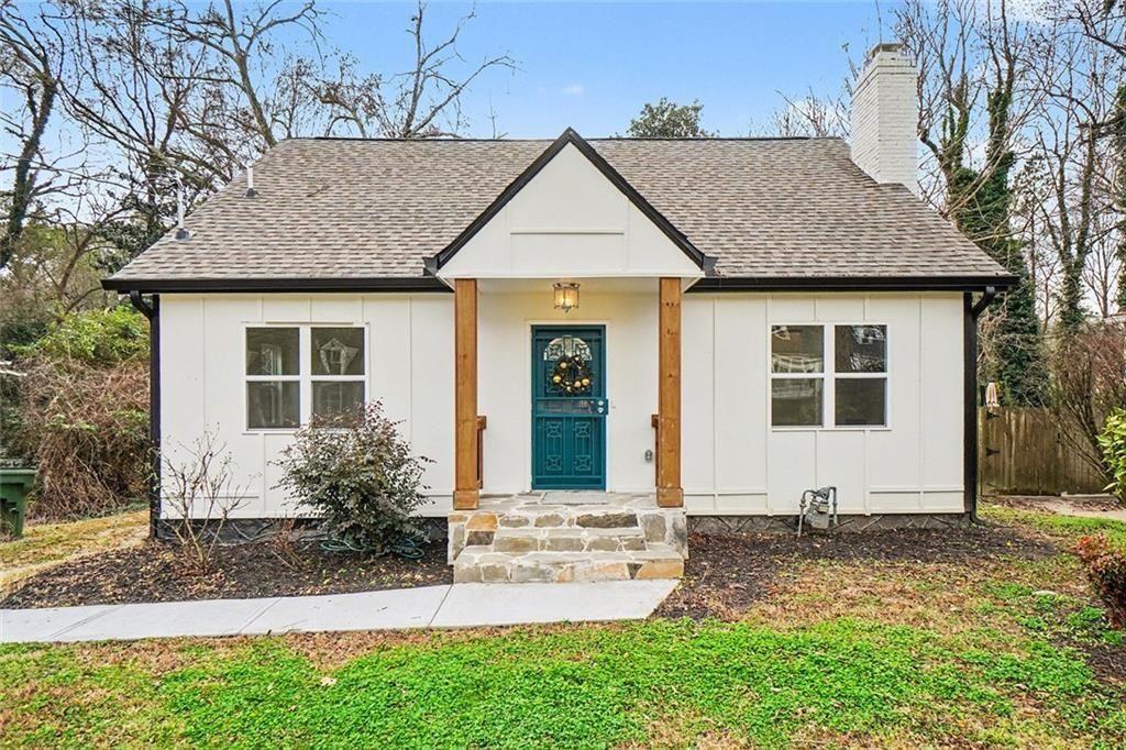 front view of house with a yard