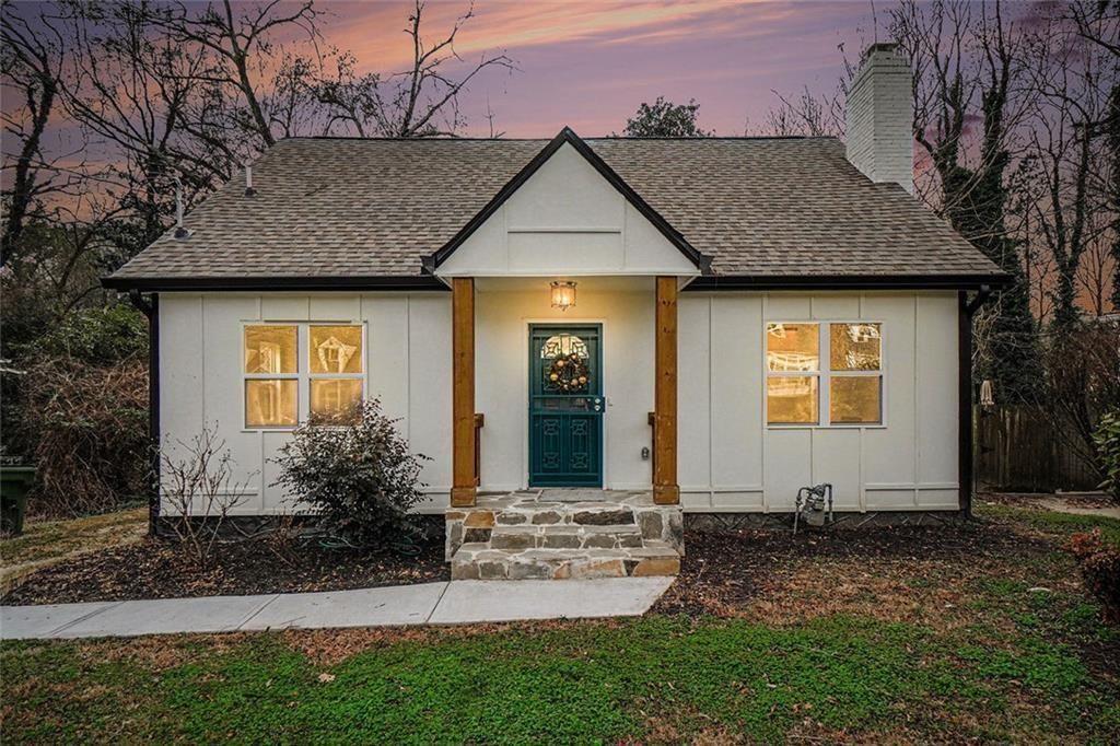 1684 Kenmore Street Southwest Atlanta, GA 30311 - Photo 2 of 30 a front view of a house with garden