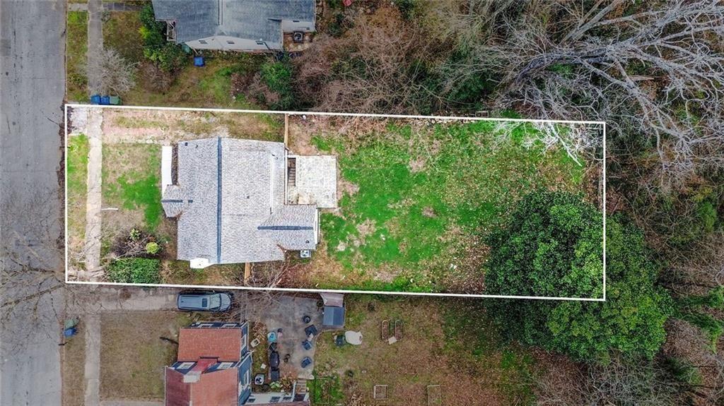 1684 Kenmore Street Southwest Atlanta, GA 30311 - Photo 3 of 30 an aerial view of a house with a yard and garden