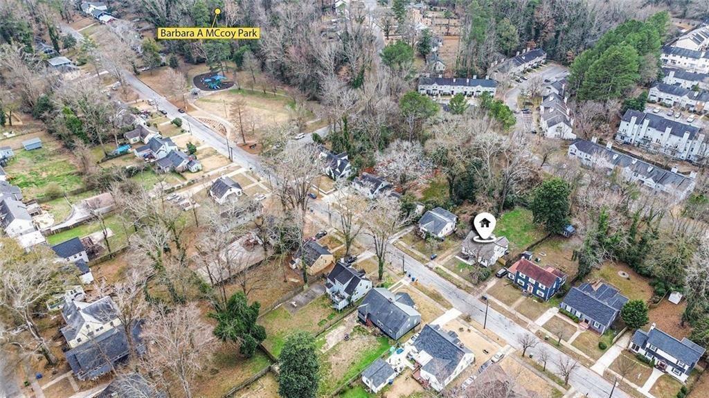 1684 Kenmore Street Southwest Atlanta, GA 30311 - Photo 4 of 30 a aerial view of a house with a yard and sitting area