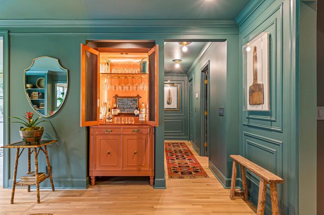 a kitchen with a table and chairs