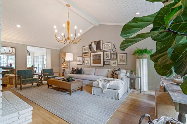 a view of a floor to ceiling window and a kitchen