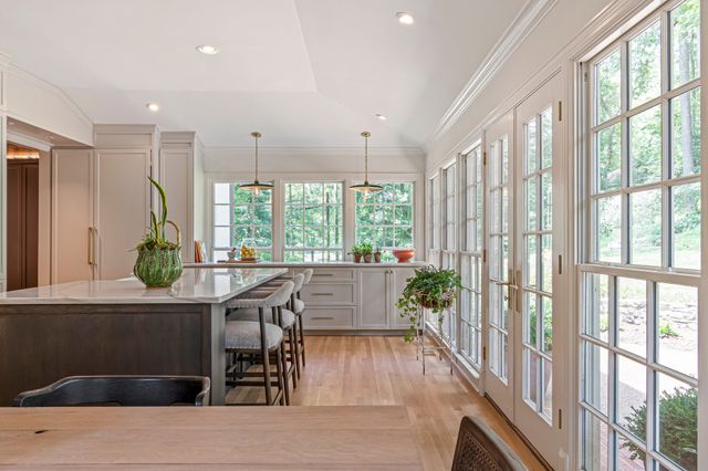 a bedroom with two beds and a couch