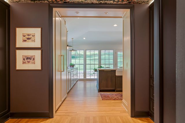 a view of a wooden fence and a bench