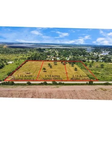 a view of an outdoor space with wooden floor