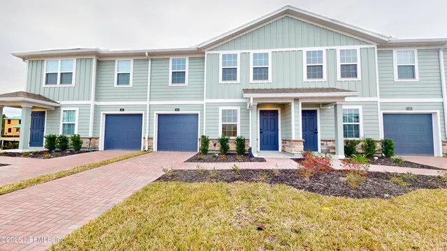 a front view of a house with swimming pool