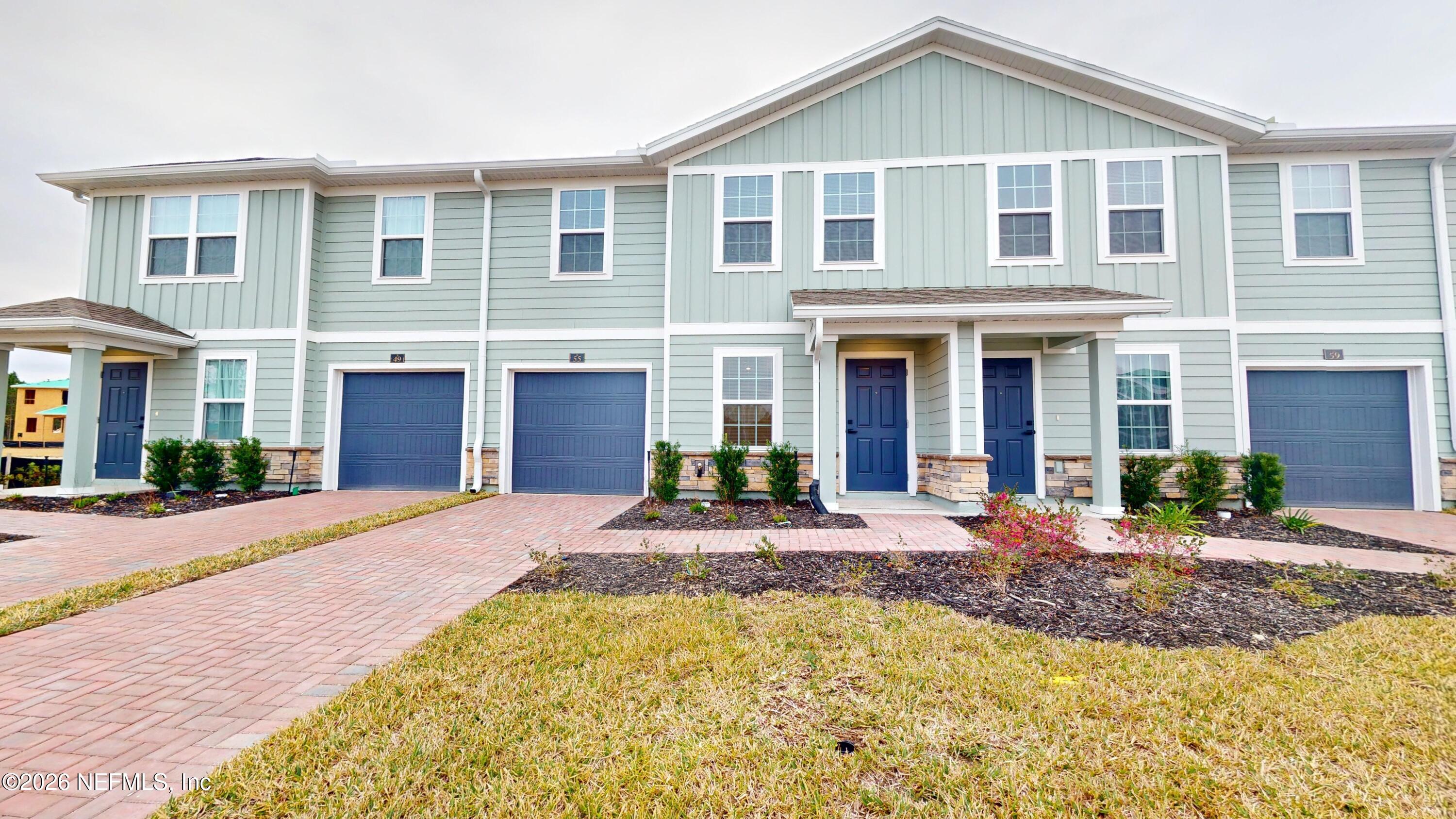a front view of a house with swimming pool