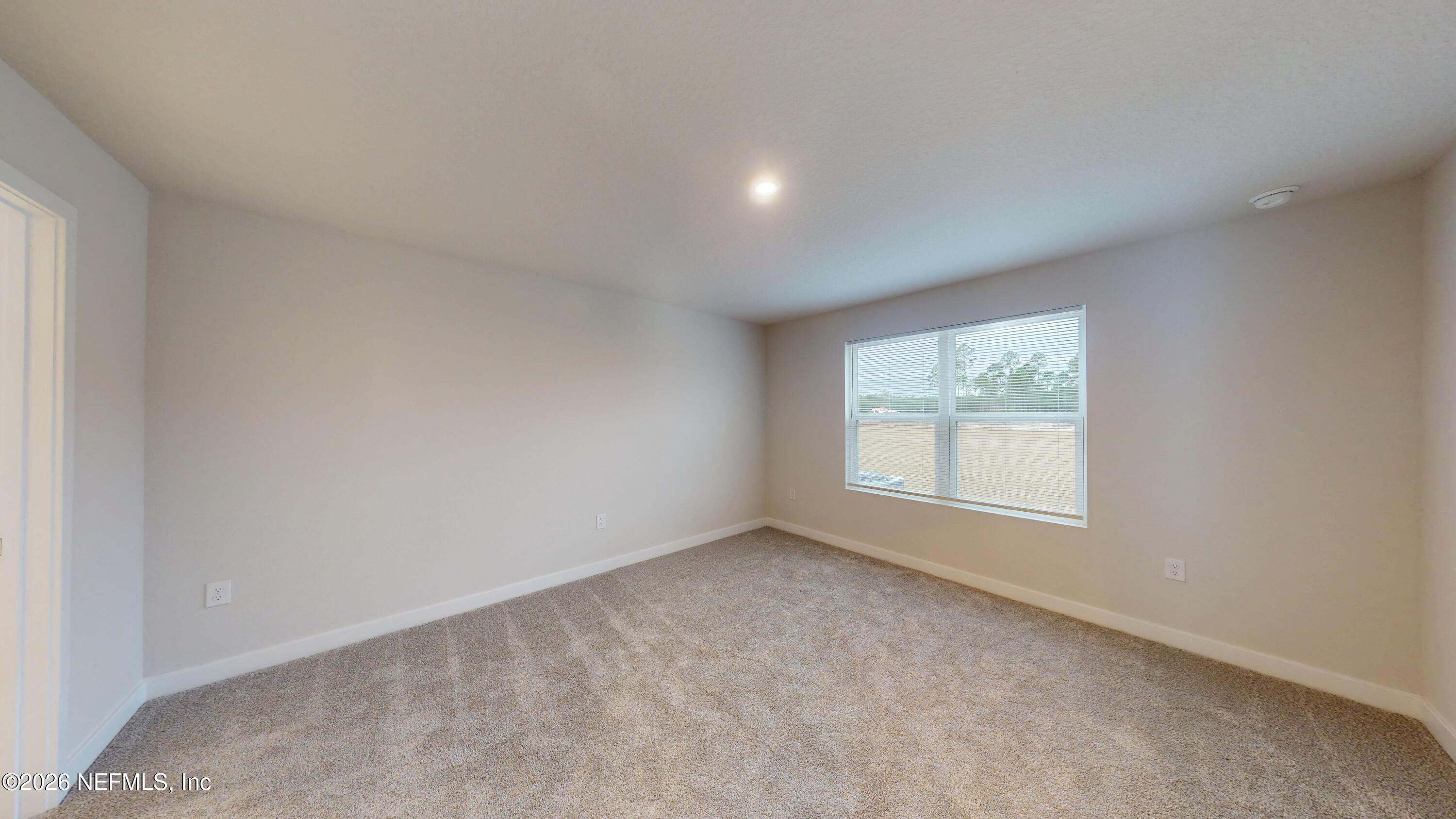 55 Gaston Court St. Augustine, FL 32092 - Photo 16 of 41 an empty room with a window
