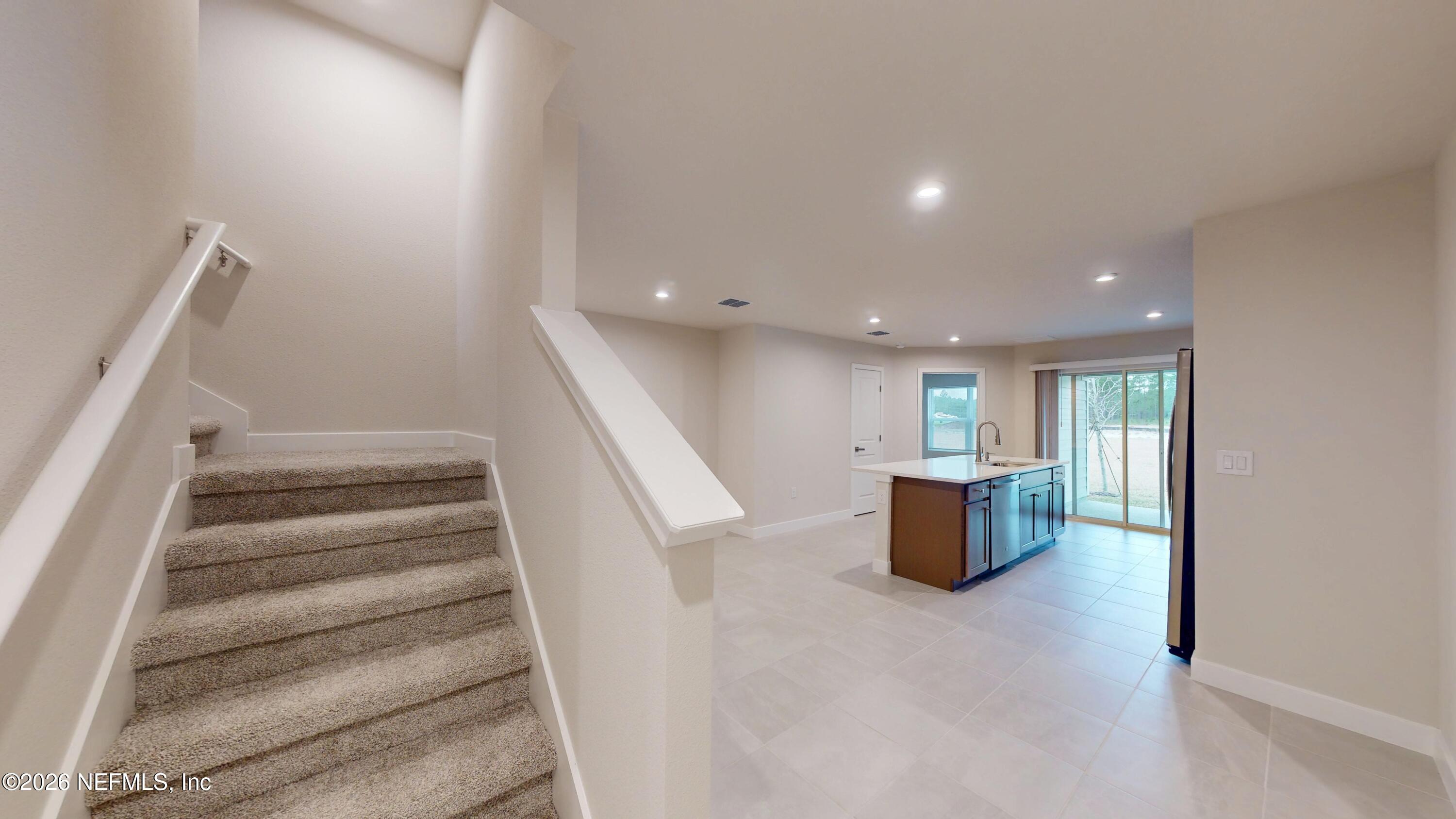 55 Gaston Court St. Augustine, FL 32092 - Photo 6 of 41 a view of entryway and kitchen