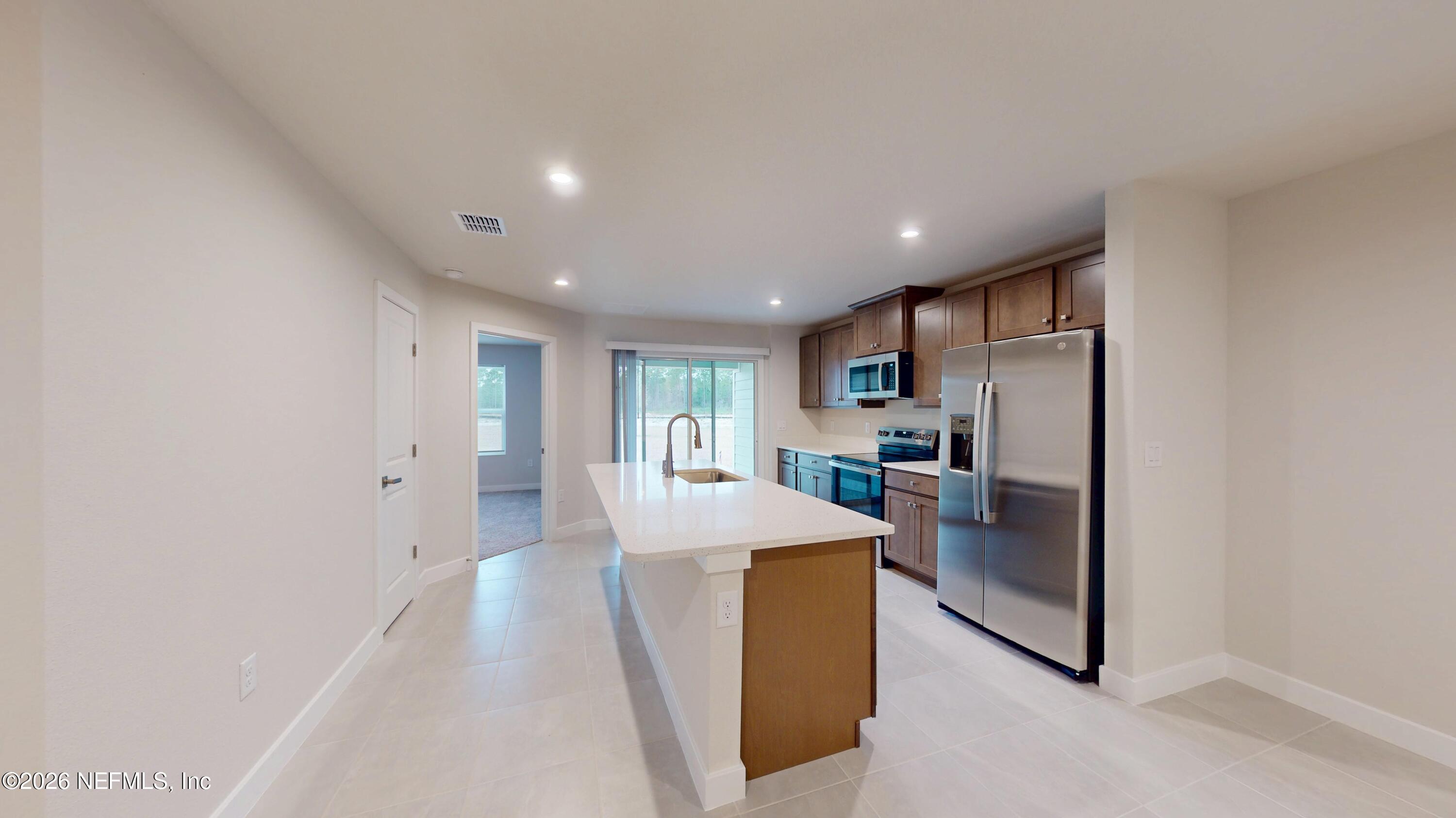 55 Gaston Court St. Augustine, FL 32092 - Photo 8 of 41 a view of kitchen with cabinets