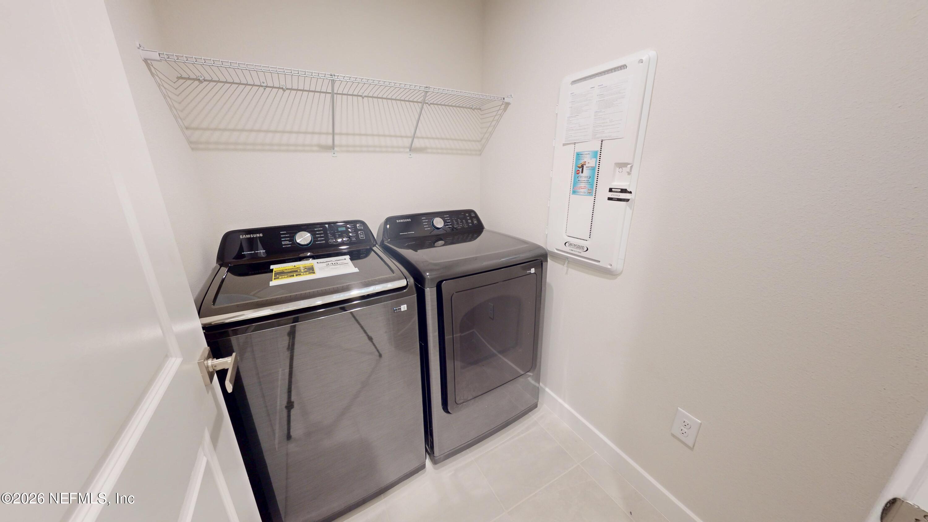 55 Gaston Court St. Augustine, FL 32092 - Photo 10 of 41 a utility room with dryer and washer