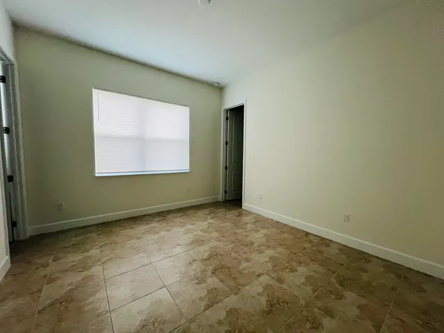an empty room with a window