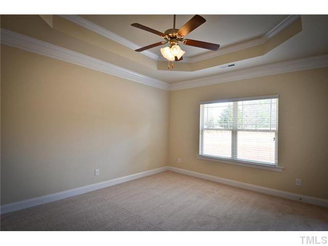 244 Nortwick Road Rolesville, NC 27571 - Photo 8 of 15 First floor master bedroom with tray ceiling.