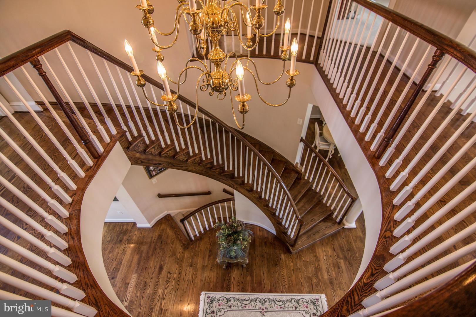 13870 Waverly Point Road Newburg, MD 20664 - Photo 4 of 30 Beautiful curved staircase
