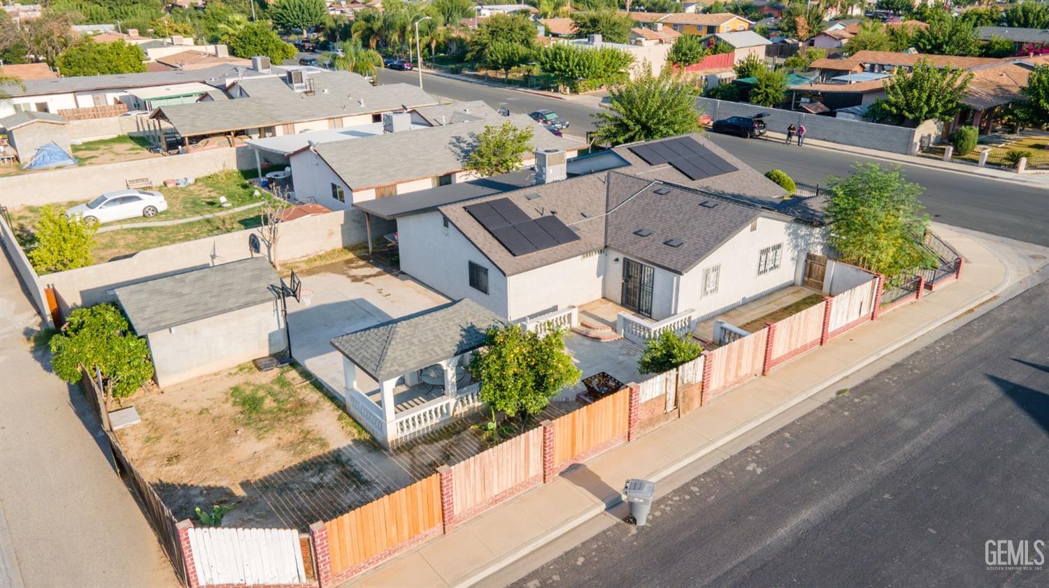 Undisclosed Address Delano, CA 93215 - Photo 18 of 19 an aerial view of multiple houses with yard