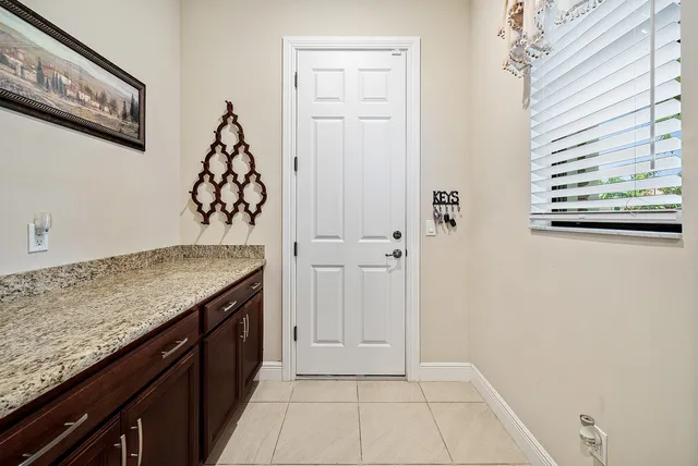 a view of a kitchen cabinets and a stove top oven