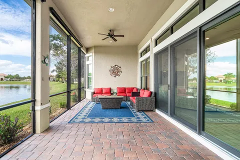 a view of a porch with wooden floor and outdoor space