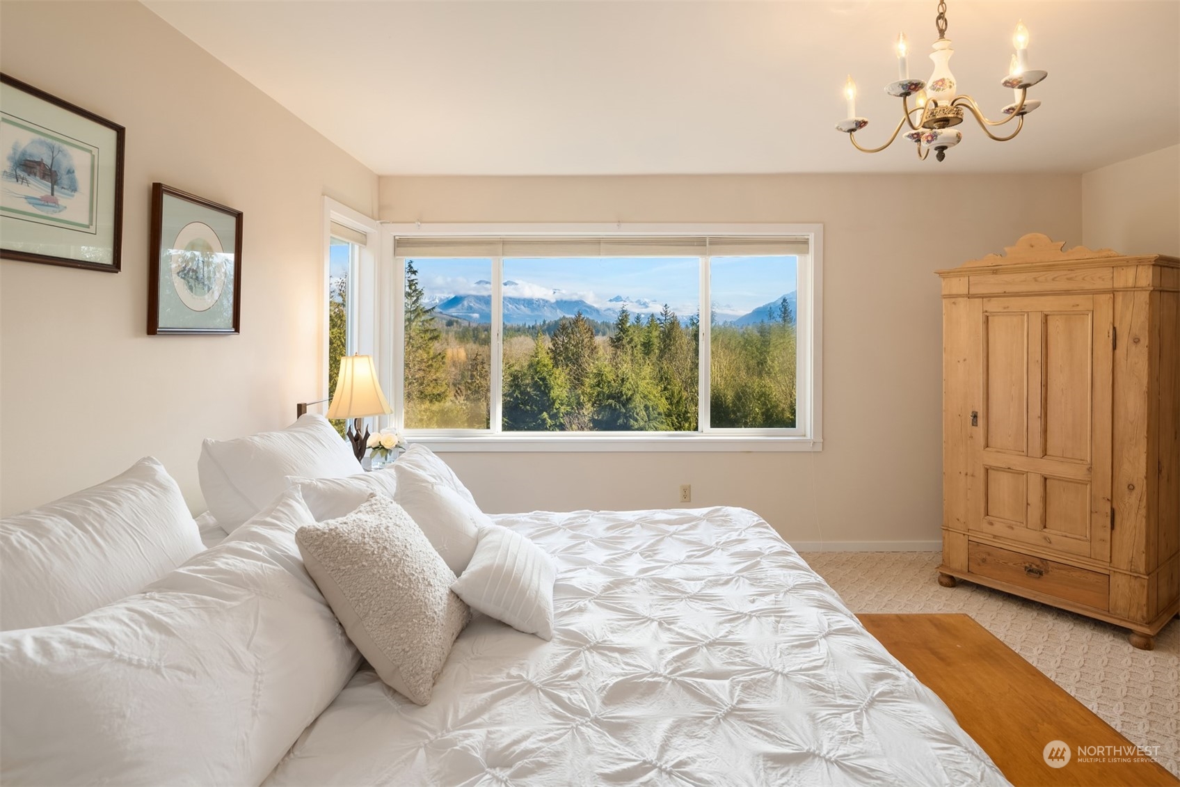 13106 Reiner Road Monroe, WA 98272 - Photo 20 of 37 a bedroom with a large bed and a window