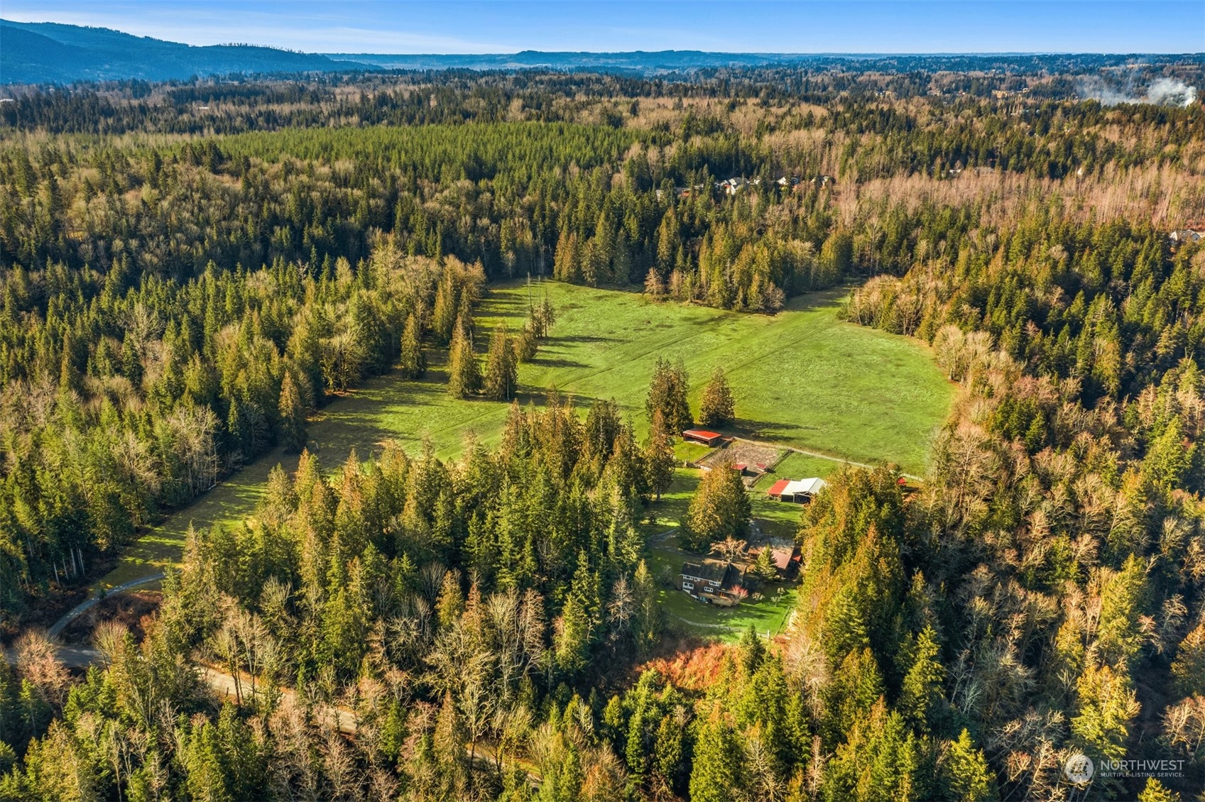 13106 Reiner Road Monroe, WA 98272 - Photo 36 of 37 a view of a lake with a city view