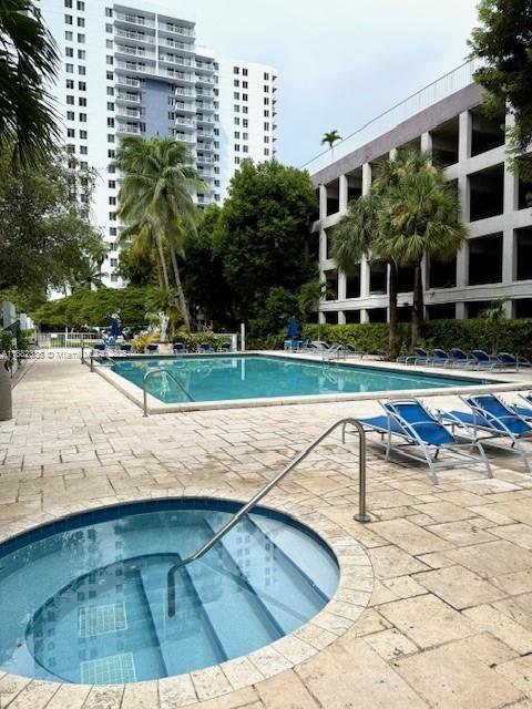 800 North Miami Avenue, Unit E1201 Miami, FL 33136 - Photo 16 of 18 a view of a swimming pool with a patio