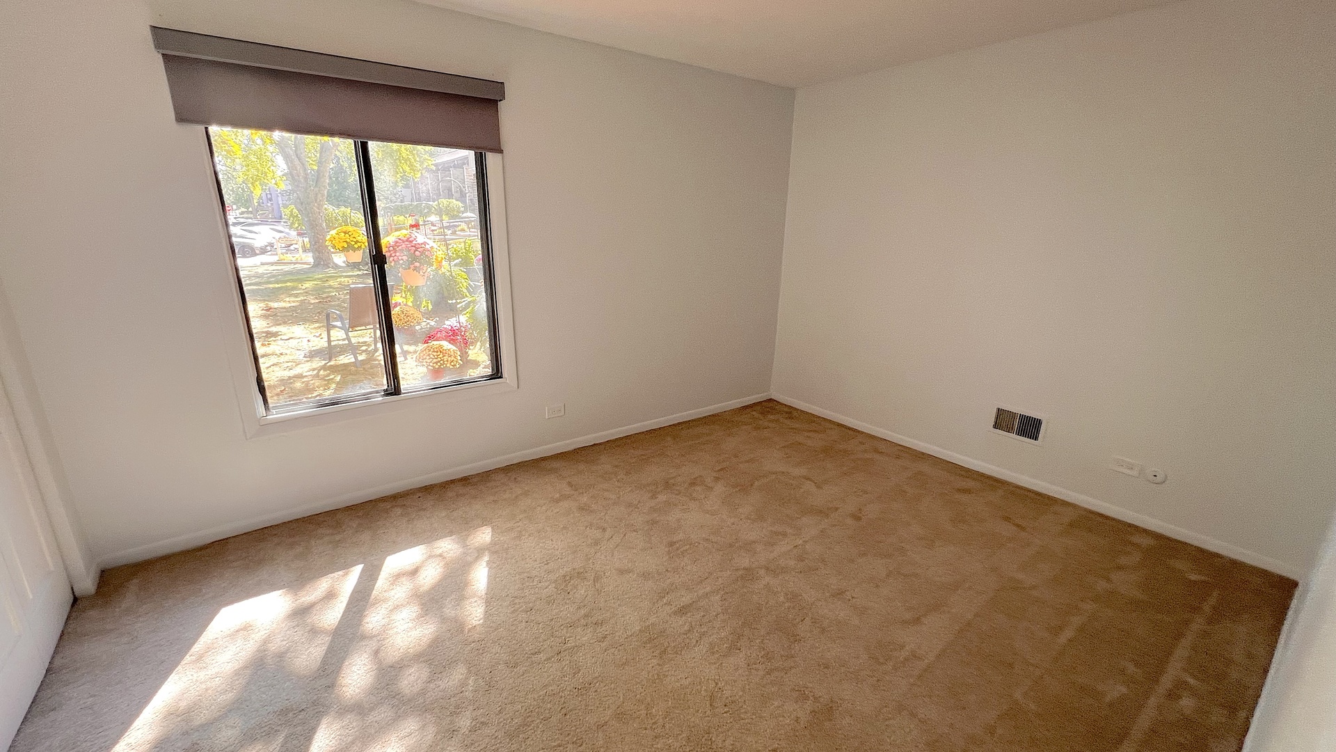 521 73rd Street, Unit 105 Downers Grove, IL 60516 - Photo 13 of 17 an empty room with a window