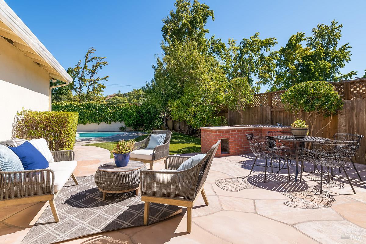 88 Elena Circle San Rafael, CA 94903 - Photo 1 of 1 a view of a patio with couches table and chairs and potted plants