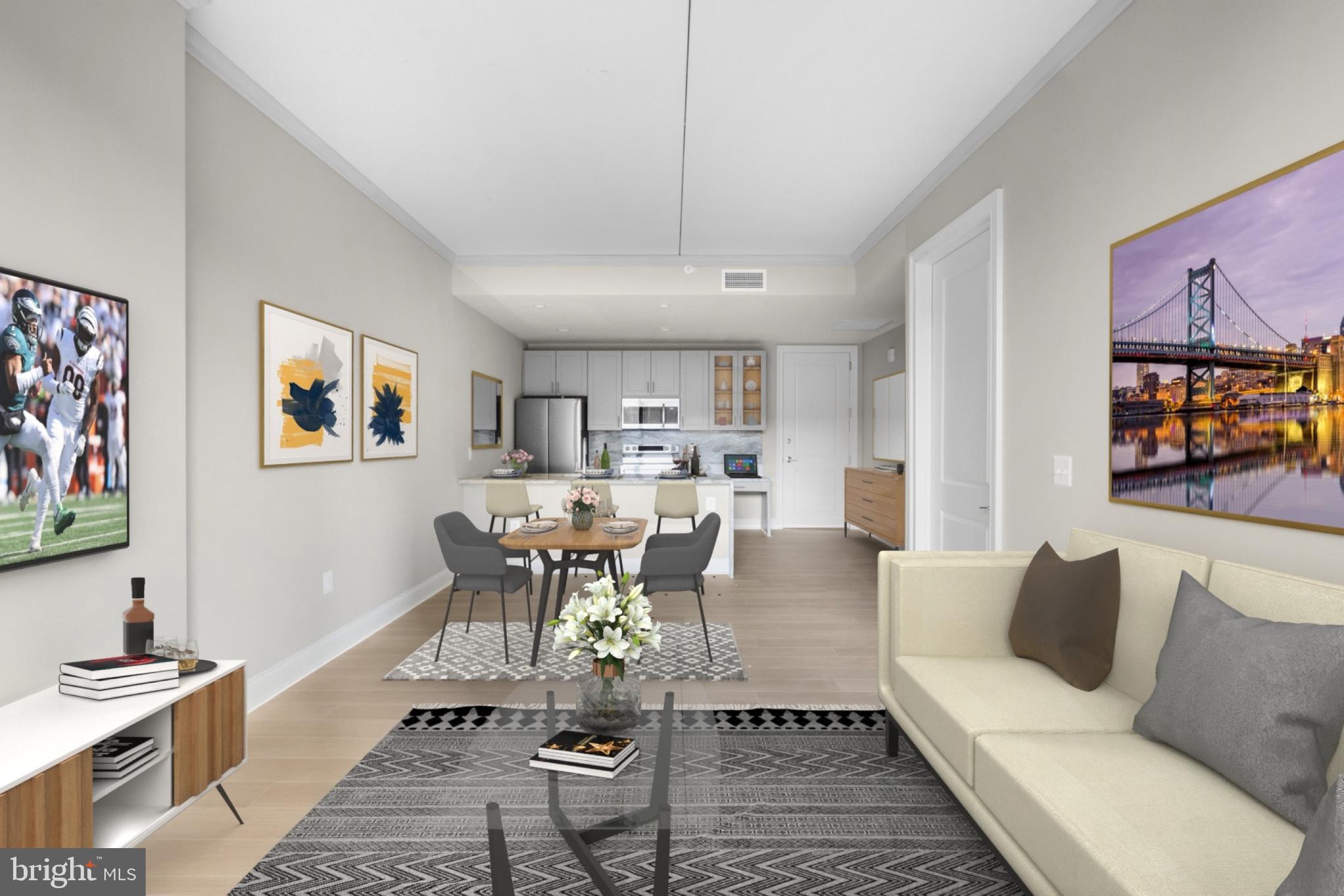 2301-61 John F Kennedy Boulevard, Unit 1902 Philadelphia, PA 19103 - Photo 17 of 39 a living room with furniture and a rug