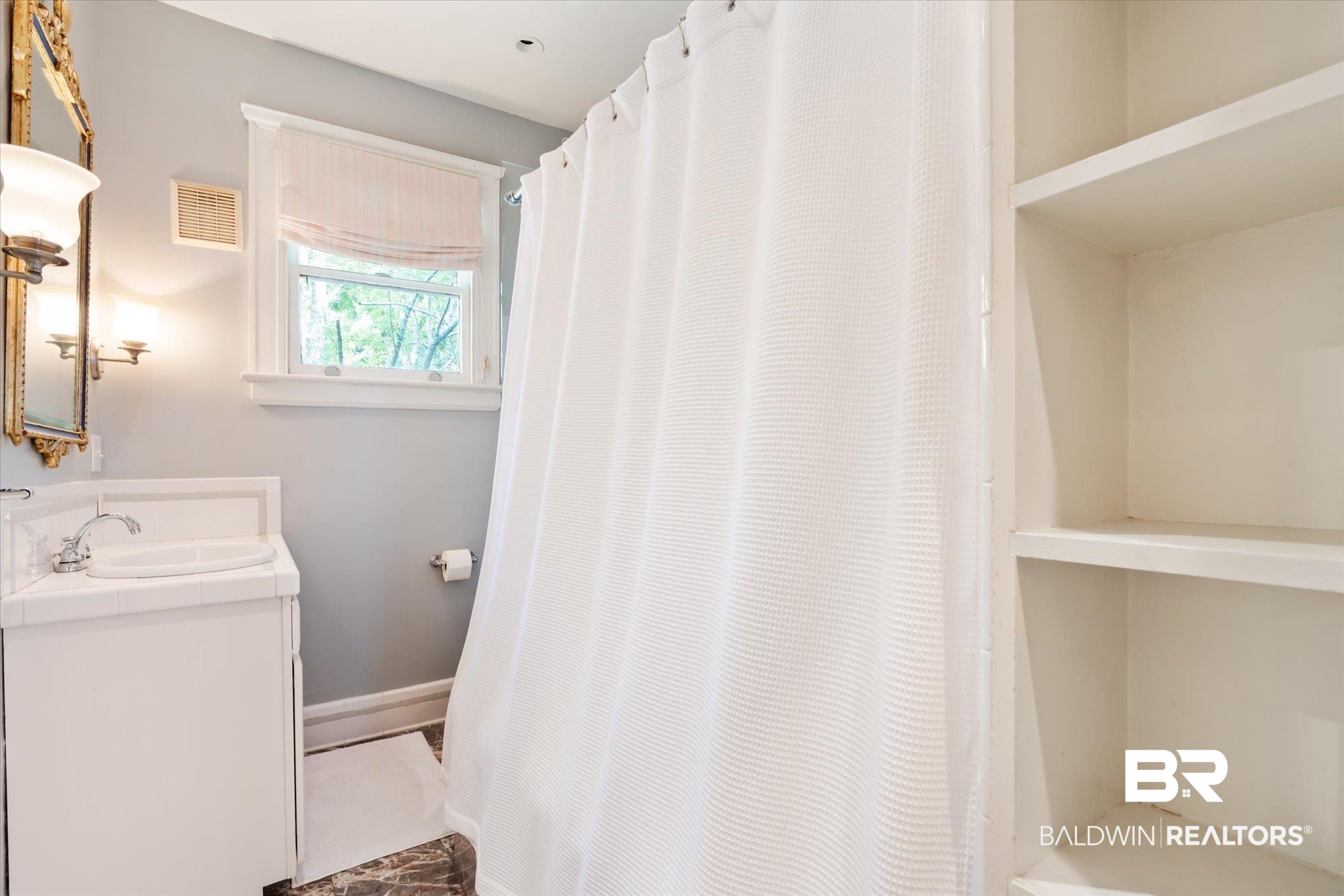 68 North Monterey Street Mobile, AL 36604 - Photo 22 of 30 Bathroom featuring vanity and tile patterned flooring