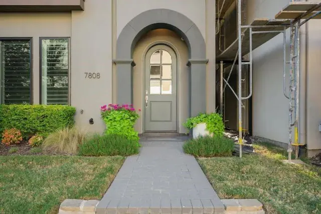 a view of a garden with pathway